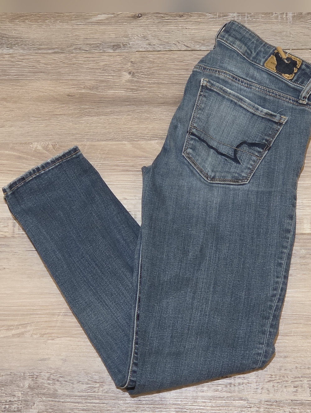 American Eagle Super Stretch Skinny Jeans in Faded Denim Blue Womens Size 4 Reg